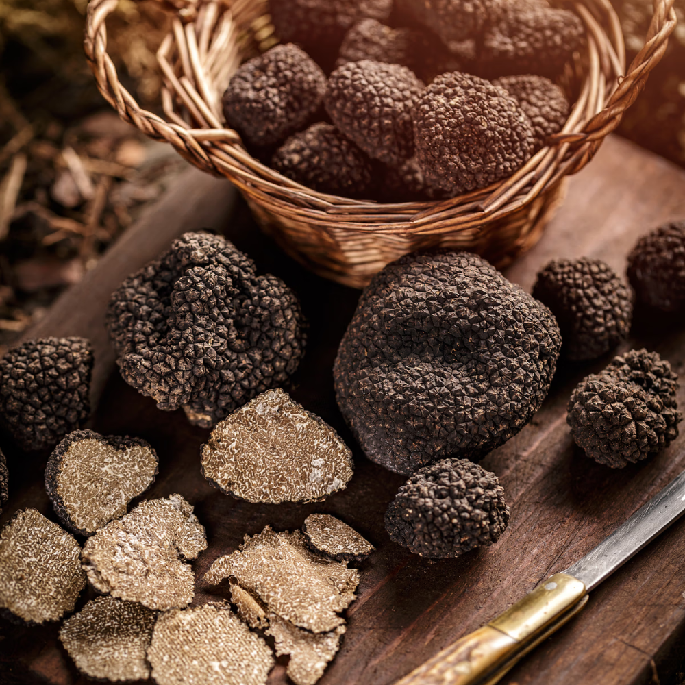 Whole black truffles and specialty truffle preparations